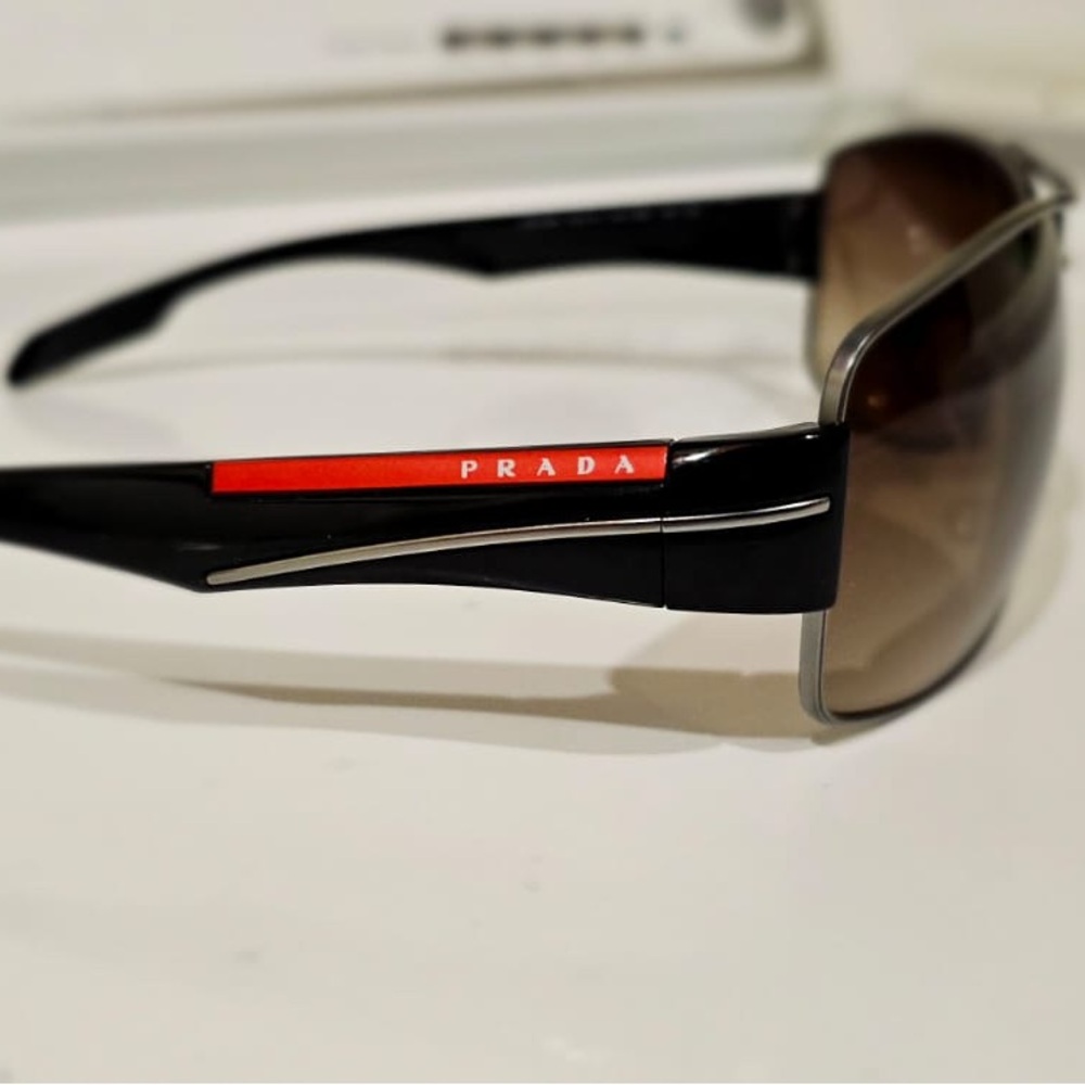 Men’s authentic Prada sun glasses with proof of receipt